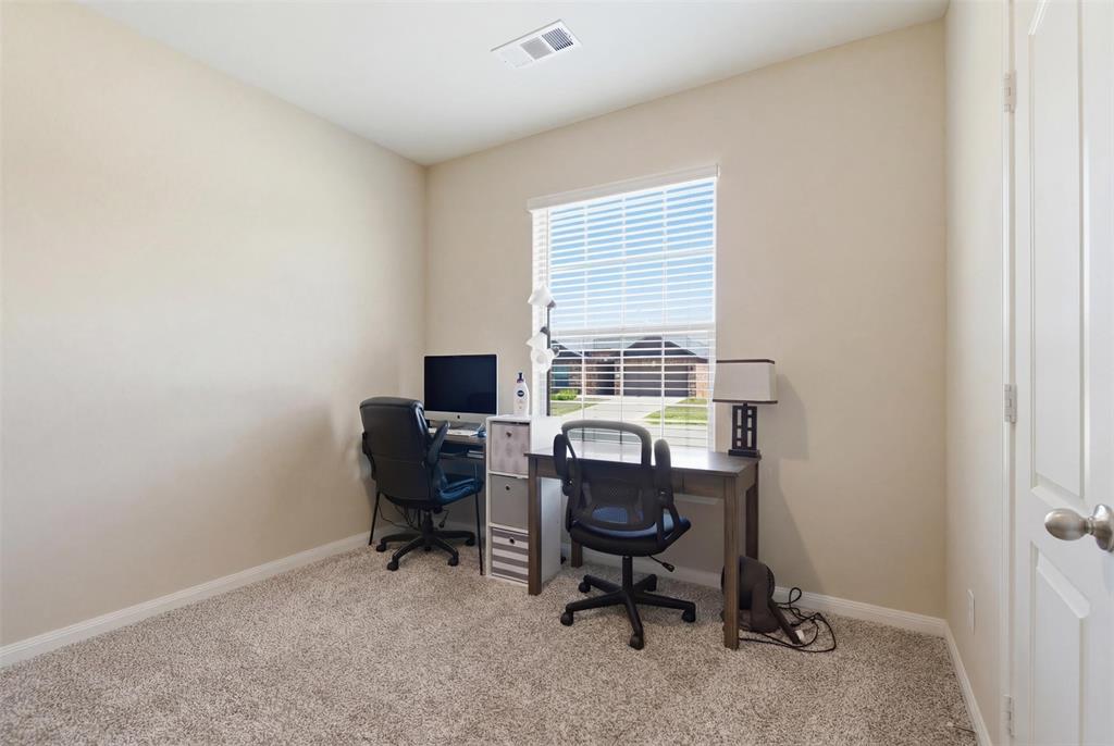 292 Wandering Stream Way Princeton, TX 75407 - Photo 19 of 40 Office area featuring light colored carpet and baseboards