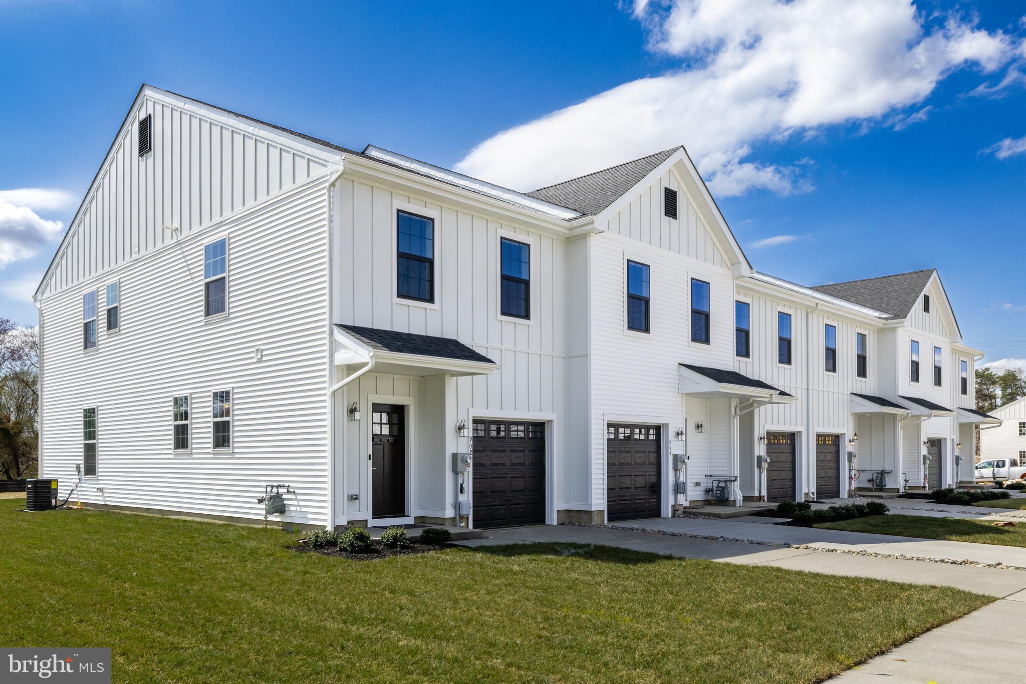 385 North Tuckahoe Road, Unit 945 Williamstown, NJ 08094 - Photo 20 of 21 a front view of a house with a yard