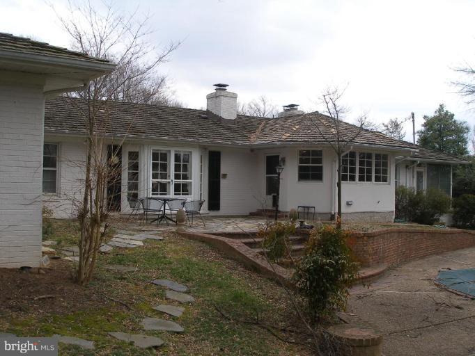 1324 Pine Tree Road McLean, VA 22101 - Photo 2 of 23 a front view of a house with garden
