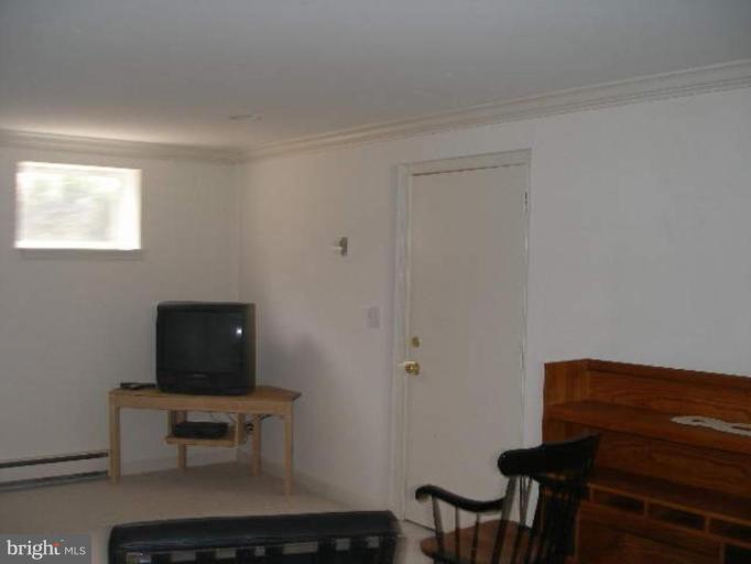 1324 Pine Tree Road McLean, VA 22101 - Photo 15 of 23 a living room with furniture and a window
