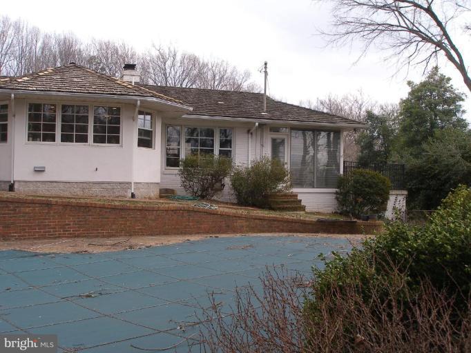 1324 Pine Tree Road McLean, VA 22101 - Photo 3 of 23 a front view of a house with garden
