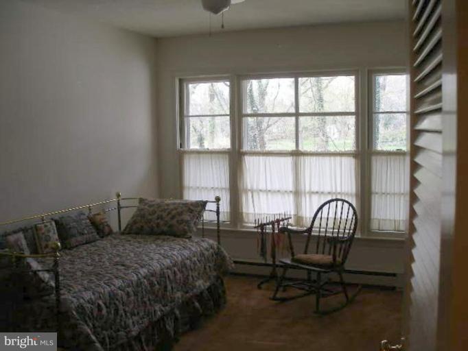 1324 Pine Tree Road McLean, VA 22101 - Photo 23 of 23 a living room with furniture and a window