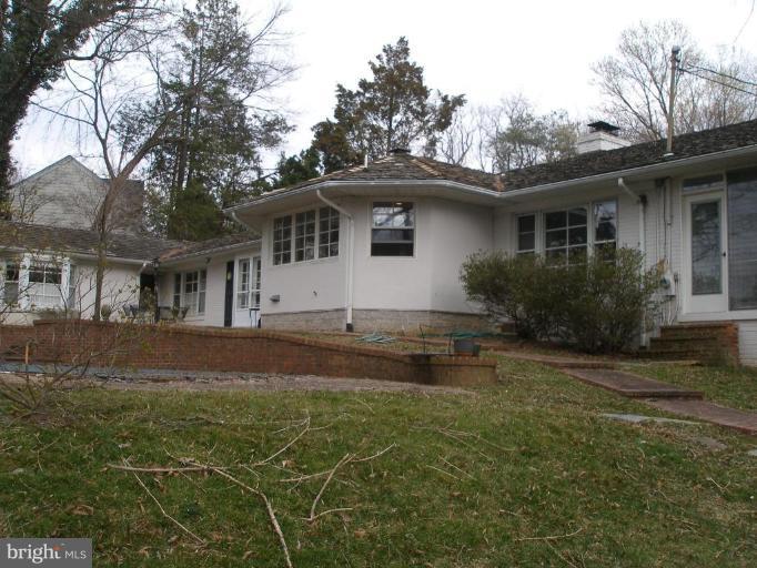 1324 Pine Tree Road McLean, VA 22101 - Photo 4 of 23 a front view of a house with garden