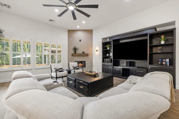 a kitchen with stainless steel appliances granite countertop a stove and cabinets