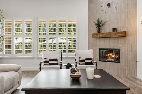 a kitchen with a large window and a sink