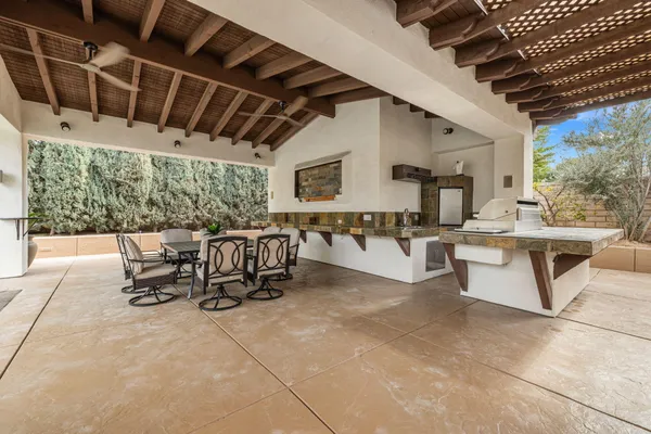 a view of a dining room with furniture window and outside view