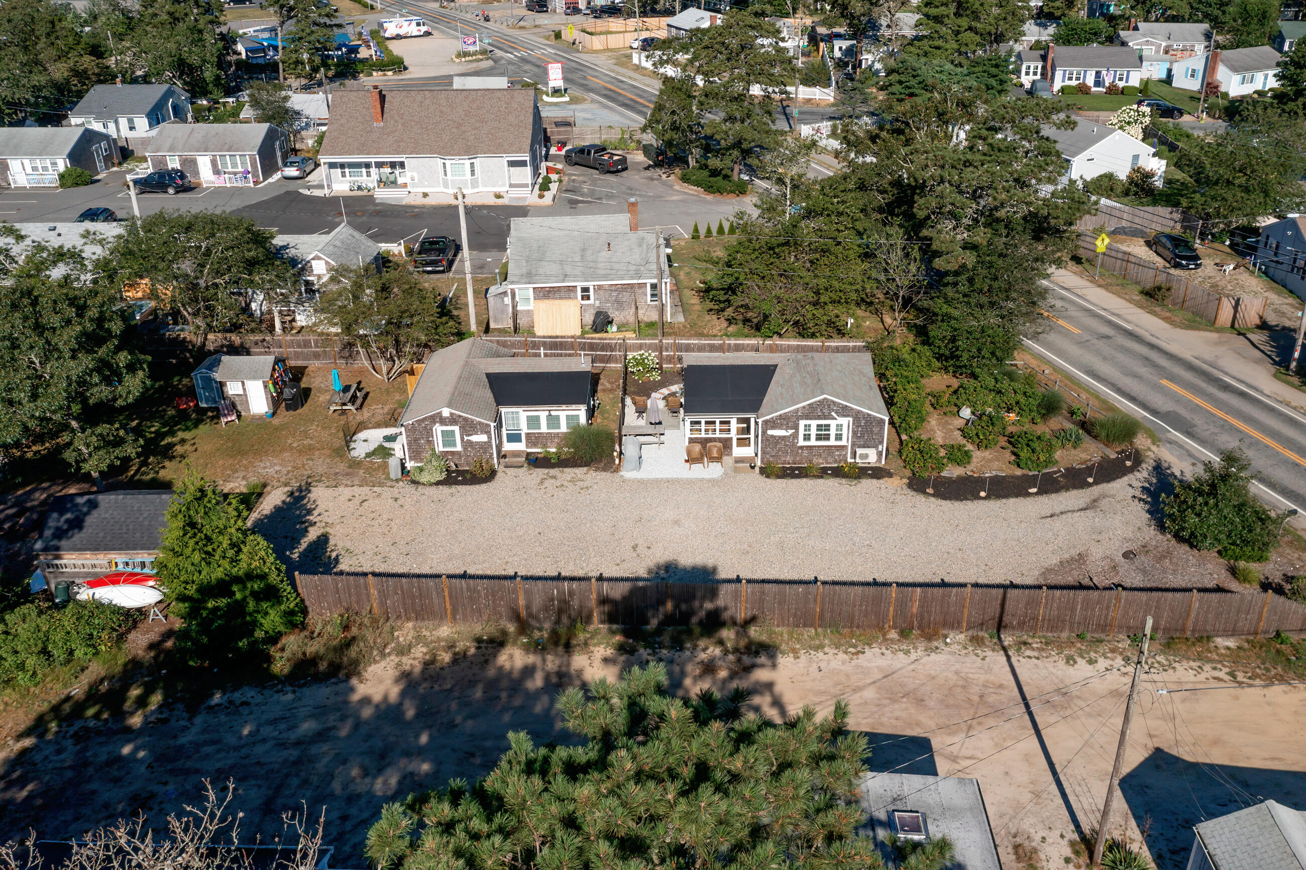209 Lower County Road Dennis Port, MA 02639 - Photo 14 of 39 an aerial view of a house with outdoor space