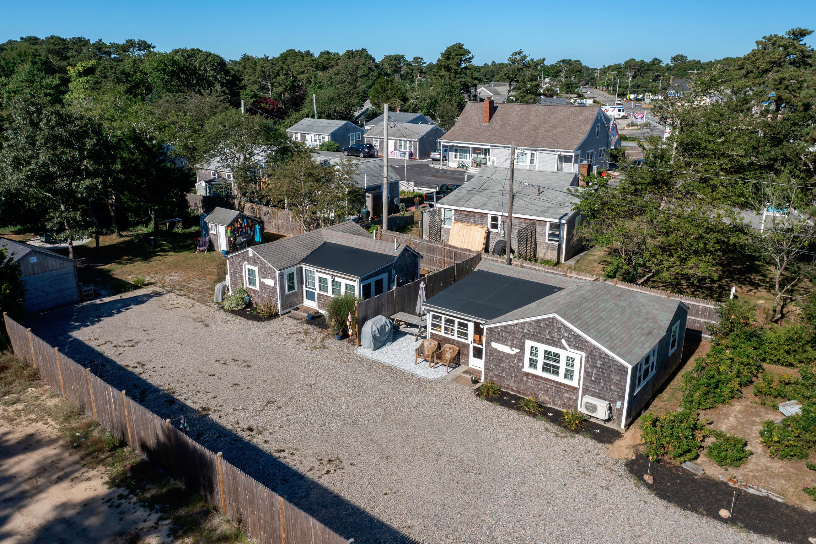 209 Lower County Road Dennis Port, MA 02639 - Photo 15 of 39 an aerial view of a house with swimming pool and mountains