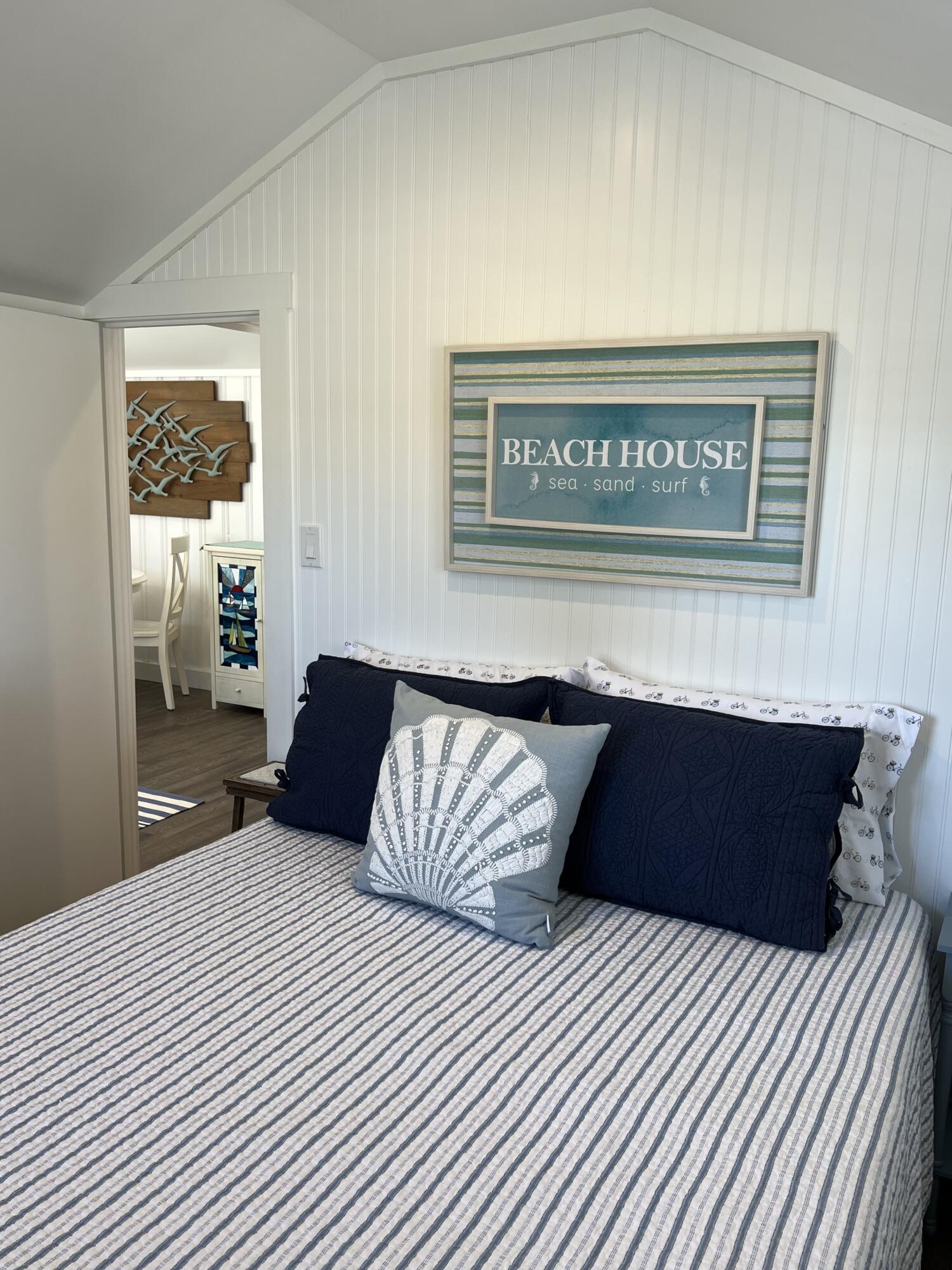 209 Lower County Road Dennis Port, MA 02639 - Photo 29 of 39 a bedroom with a large bed and a window