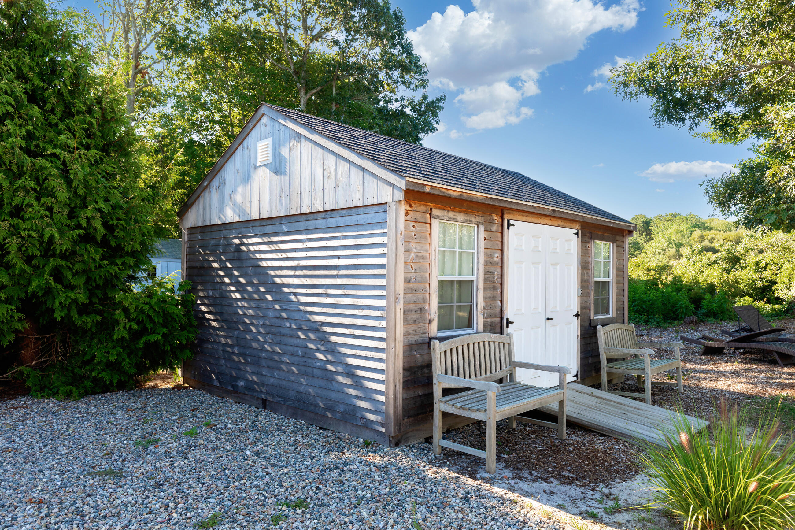 209 Lower County Road Dennis Port, MA 02639 - Photo 39 of 39 a view of a house with backyard and sitting area