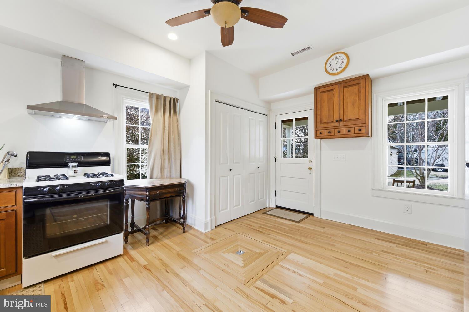 7651 Main Street Tilghman, MD 21671 - Photo 11 of 30 a bedroom with a stove and a window
