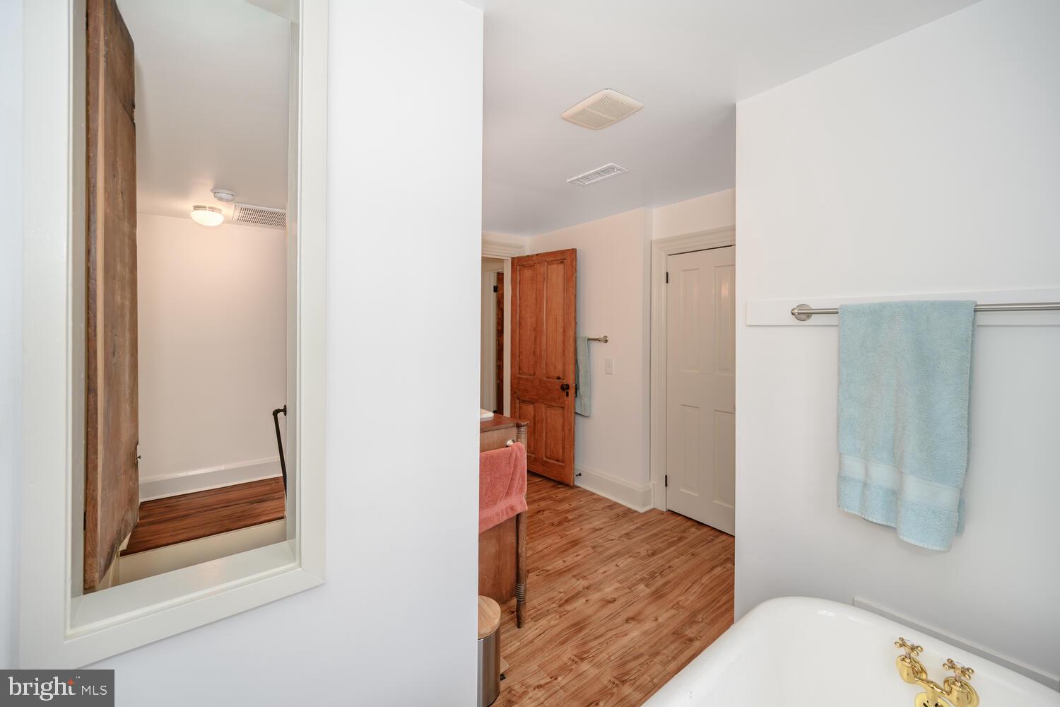 7651 Main Street Tilghman, MD 21671 - Photo 20 of 30 a bathroom with a sink and a mirror