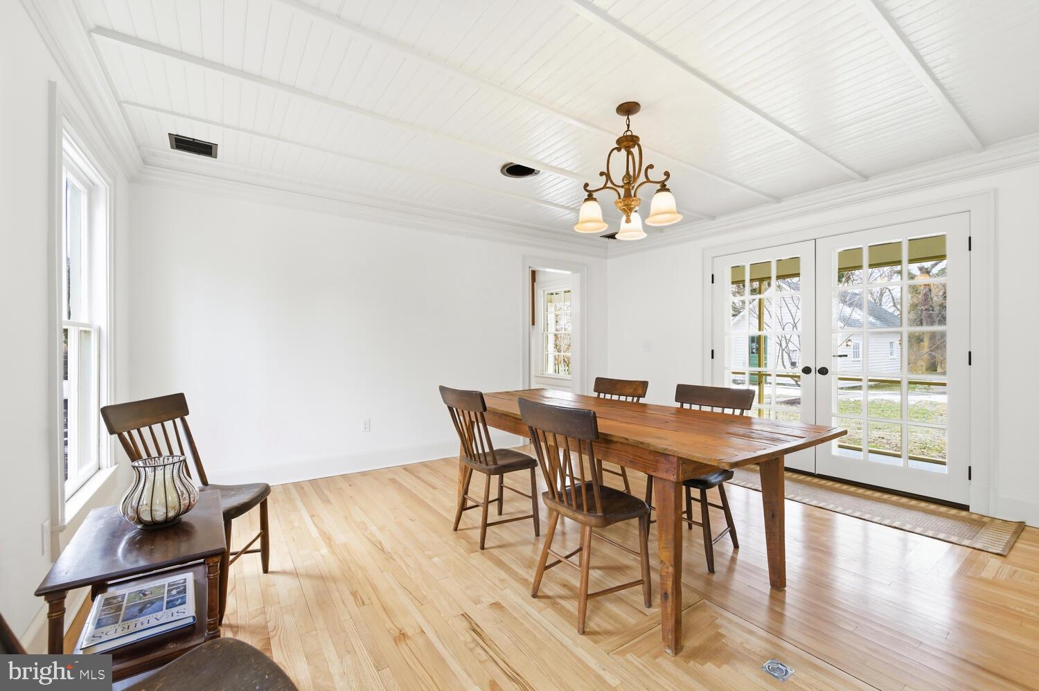 7651 Main Street Tilghman, MD 21671 - Photo 7 of 30 a view of a dining room with furniture and wooden floor