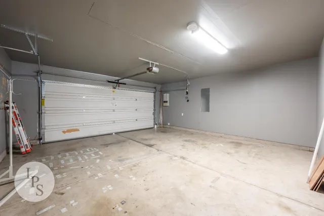 a front view of a house with garage