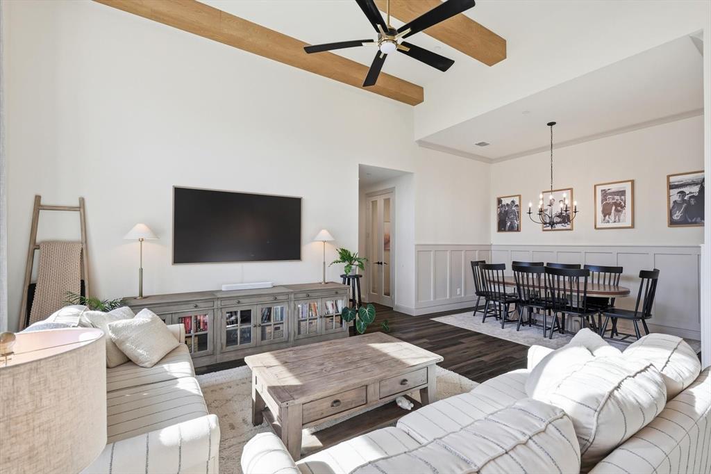 401 Lavender Lane Fairview, TX 75069 - Photo 12 of 40 a living room with furniture and a flat screen tv