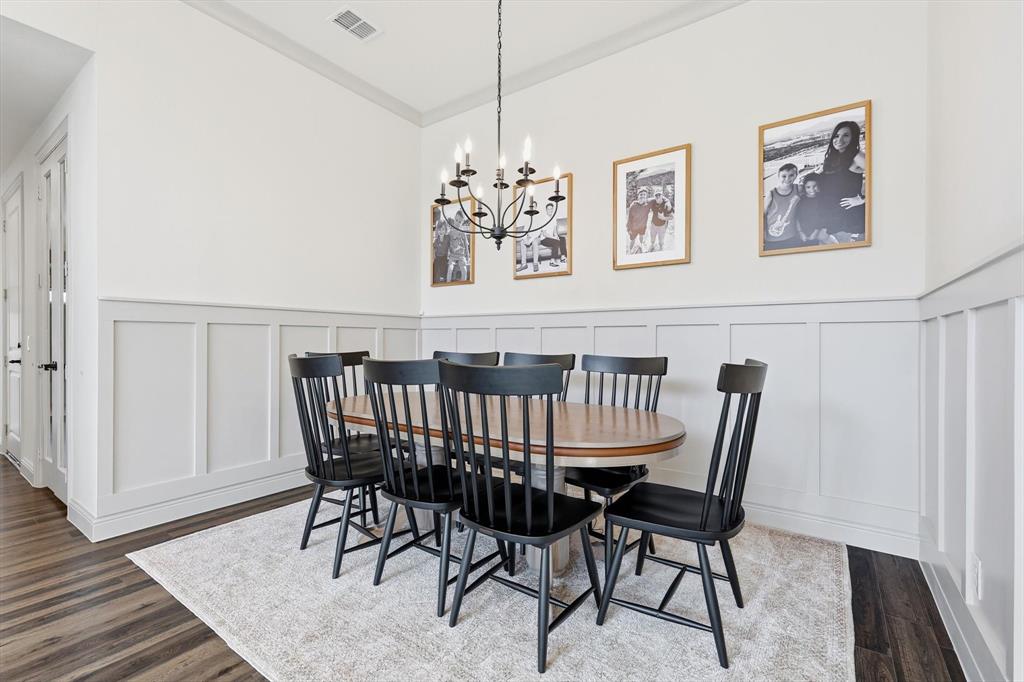 401 Lavender Lane Fairview, TX 75069 - Photo 14 of 40 a view of a dining room with furniture and wooden floor