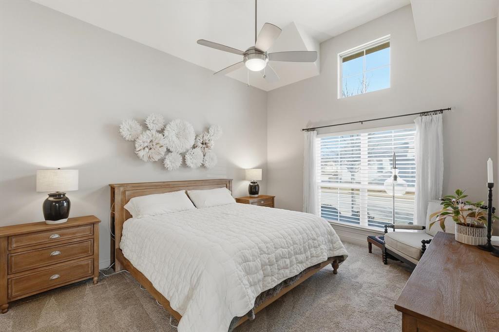 401 Lavender Lane Fairview, TX 75069 - Photo 23 of 40 a bedroom with a bed and a window