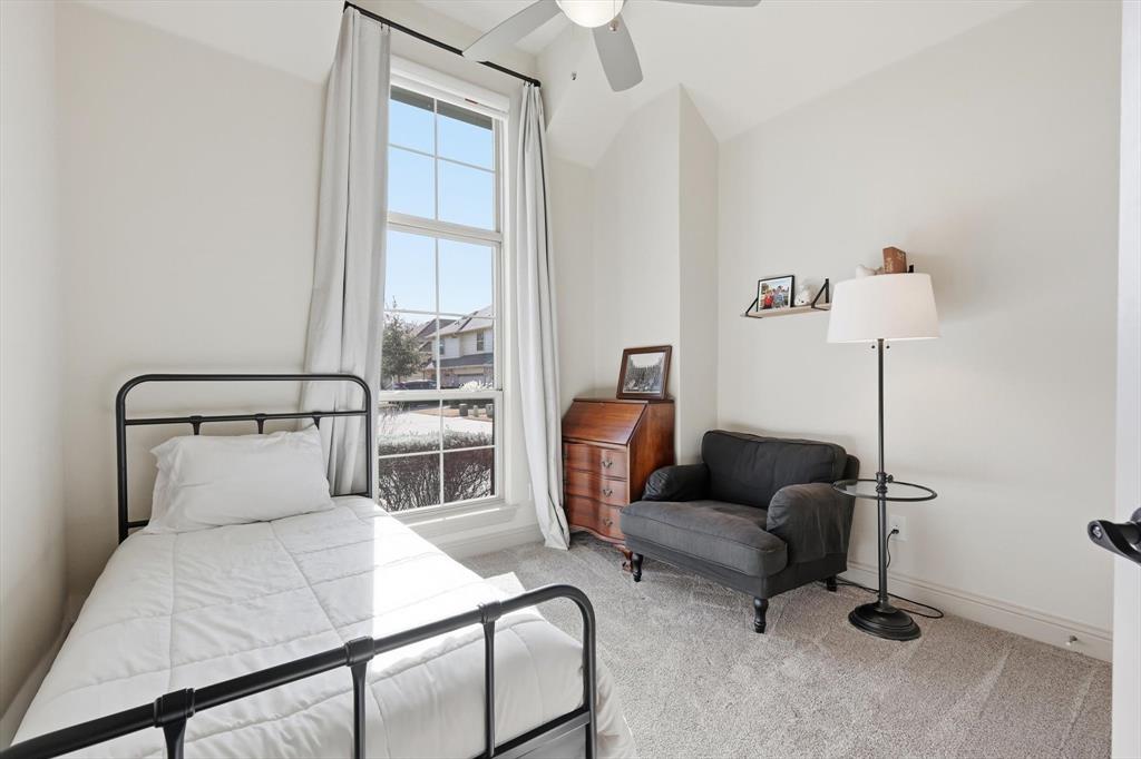 401 Lavender Lane Fairview, TX 75069 - Photo 30 of 40 a bedroom with furniture and a window