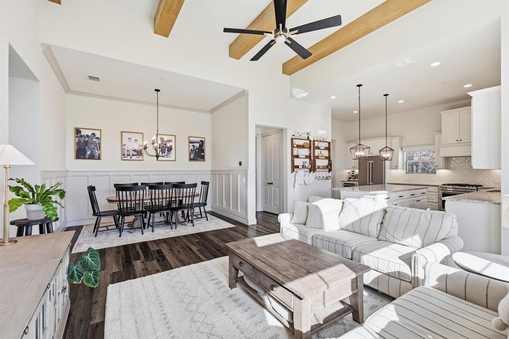 401 Lavender Lane Fairview, TX 75069 - Photo 3 of 40 a living room with fireplace furniture and a wooden floor