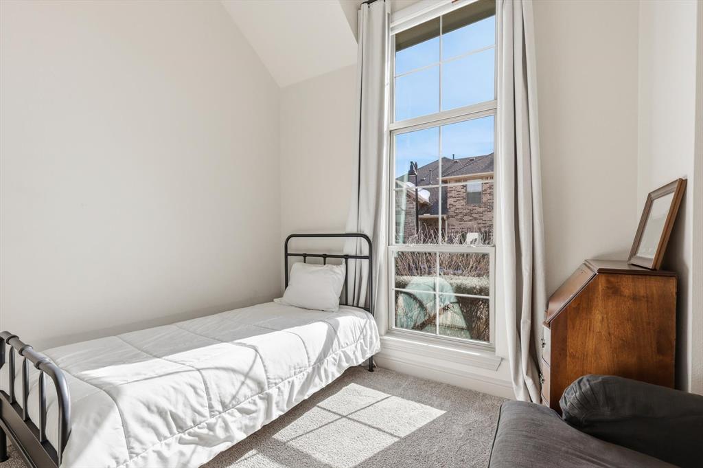 401 Lavender Lane Fairview, TX 75069 - Photo 31 of 40 a bedroom with a bed and a window