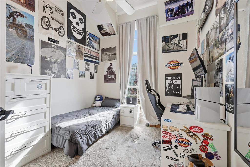 401 Lavender Lane Fairview, TX 75069 - Photo 33 of 40 a bedroom with a bed and furniture