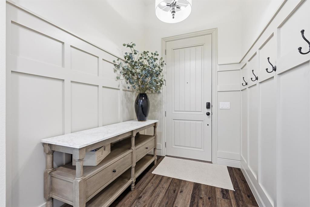 401 Lavender Lane Fairview, TX 75069 - Photo 7 of 40 a view of an entryway with wooden floor