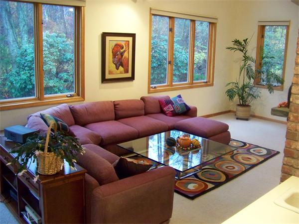 43 Garvey Road Framingham, MA 01701 - Photo 5 of 29 a living room with furniture fireplace and potted plant