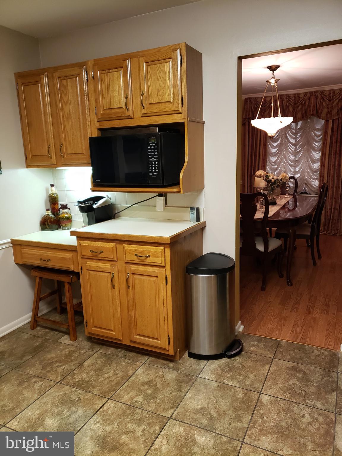 534 Farnum Road Media, PA 19063 - Photo 11 of 43 a kitchen with a stove and a refrigerator