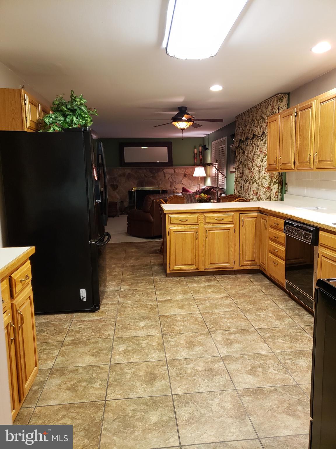 534 Farnum Road Media, PA 19063 - Photo 13 of 43 a kitchen with stainless steel appliances granite countertop a sink and a stove