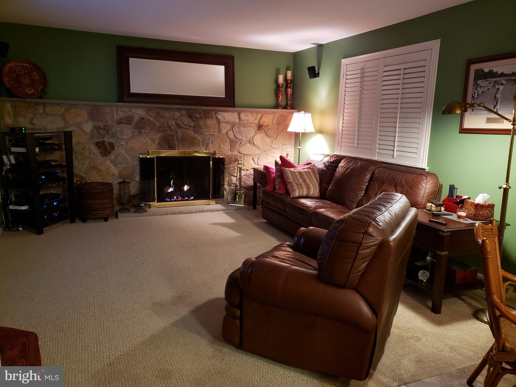 534 Farnum Road Media, PA 19063 - Photo 17 of 43 a living room with furniture and a fireplace