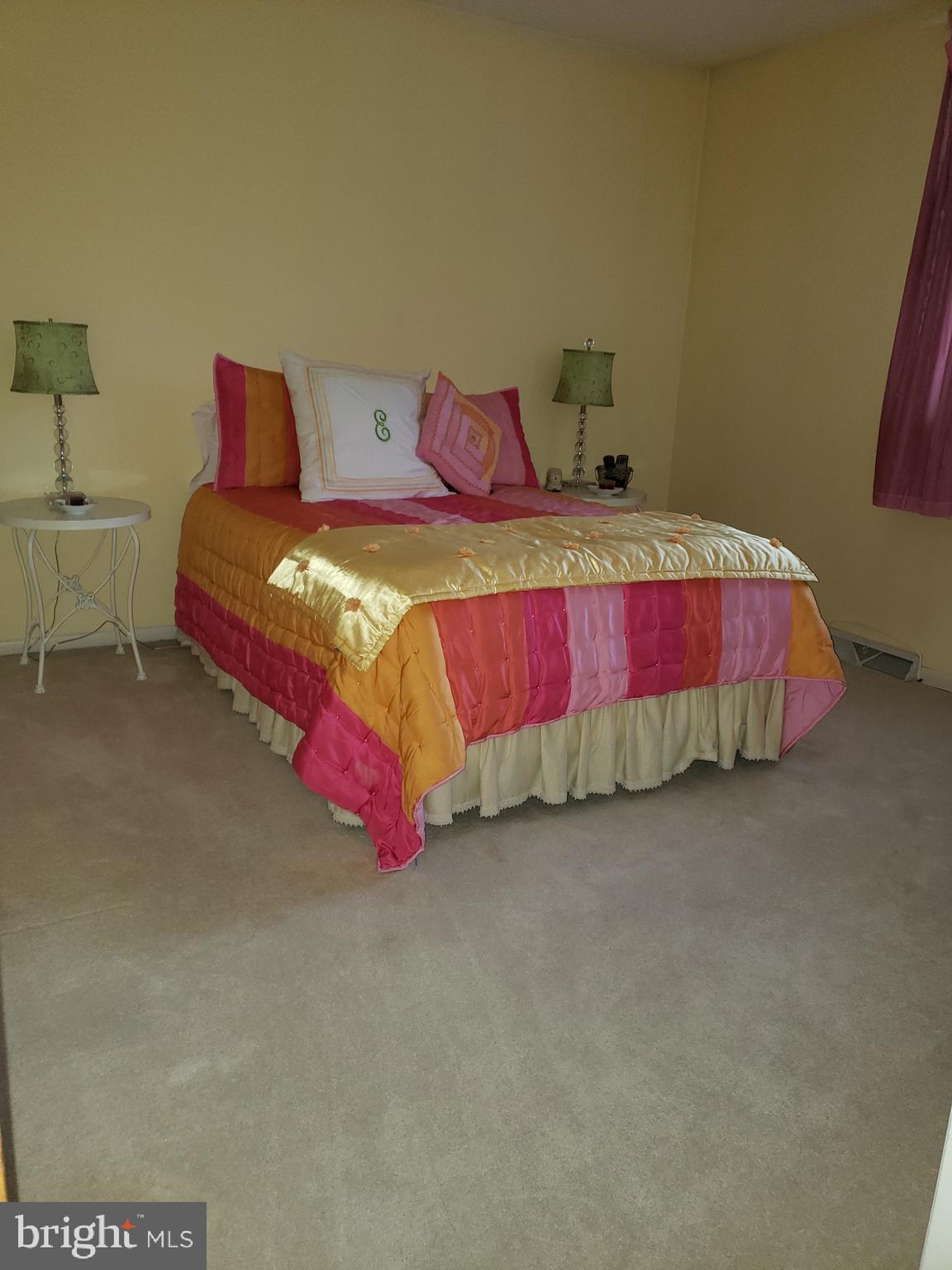 534 Farnum Road Media, PA 19063 - Photo 29 of 43 a bedroom with a bed and lamp