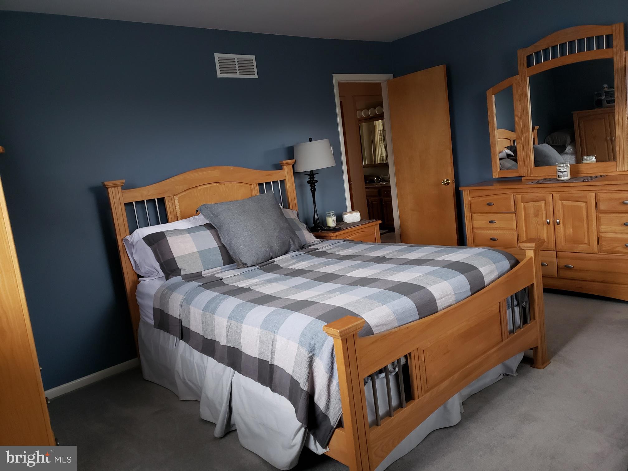 534 Farnum Road Media, PA 19063 - Photo 32 of 43 a bed sitting in a bedroom next to a window