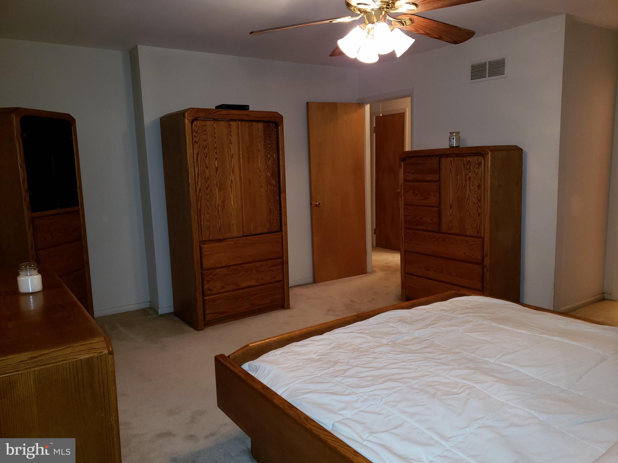 534 Farnum Road Media, PA 19063 - Photo 34 of 43 a bedroom with a bed and a dresser