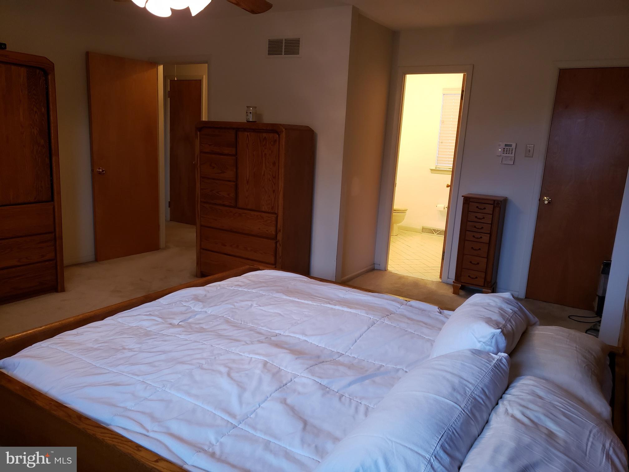534 Farnum Road Media, PA 19063 - Photo 37 of 43 a bedroom with a bed and wooden floor