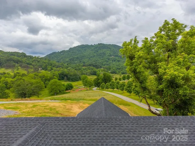 a view of a swimming pool with an outdoor space and seating area