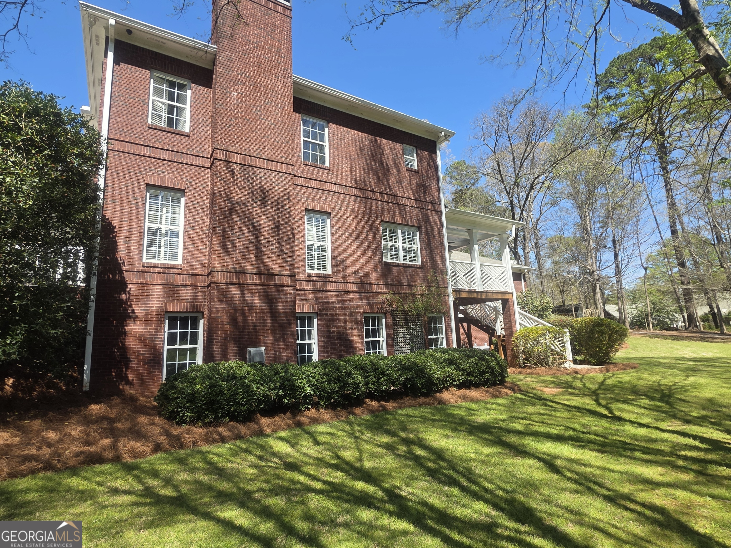 306 Calumet Lane Monroe, GA 30655 - Photo 13 of 13 a view of a building with a yard