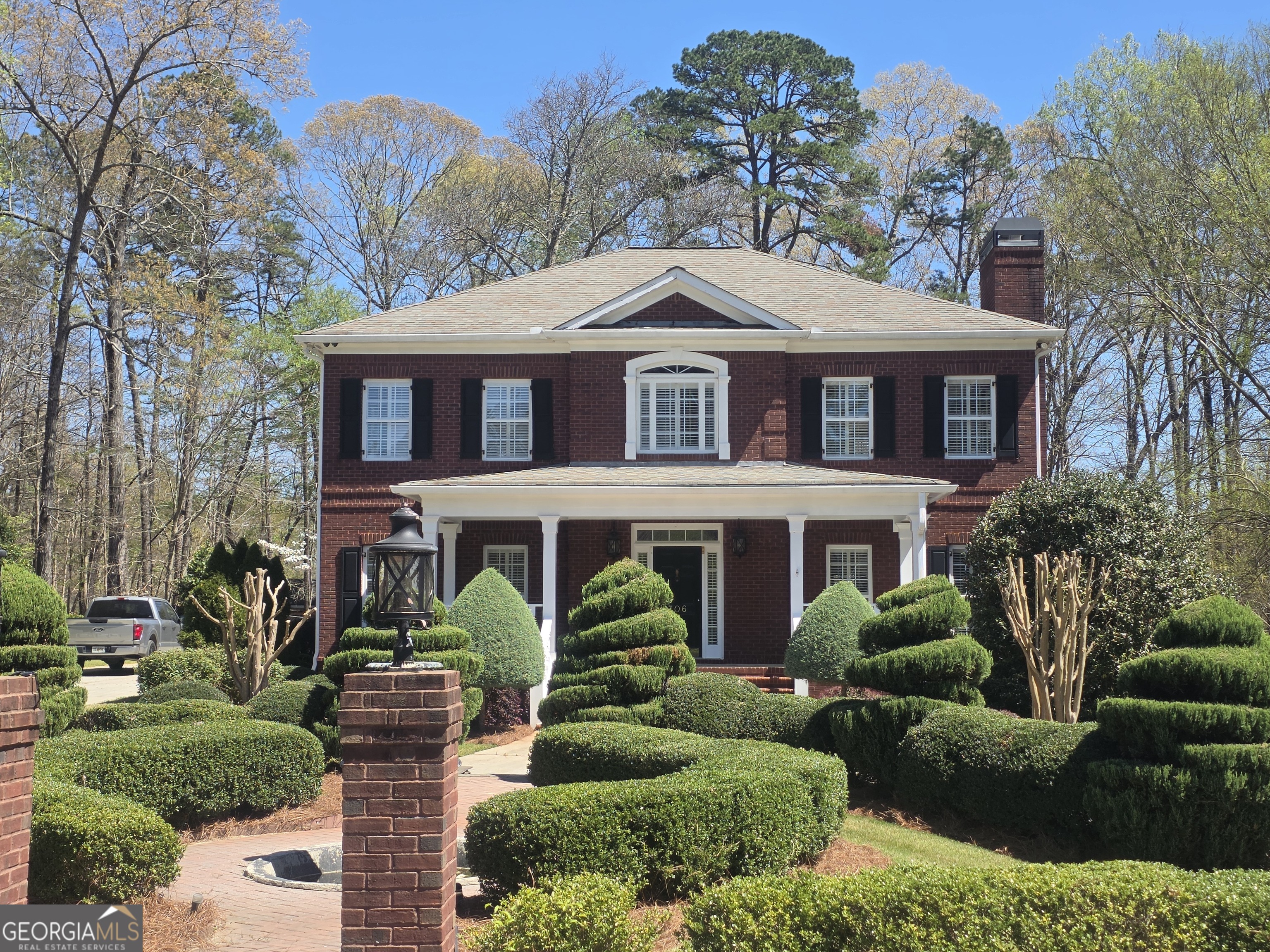306 Calumet Lane Monroe, GA 30655 - Photo 2 of 13 a front view of a house with a yard