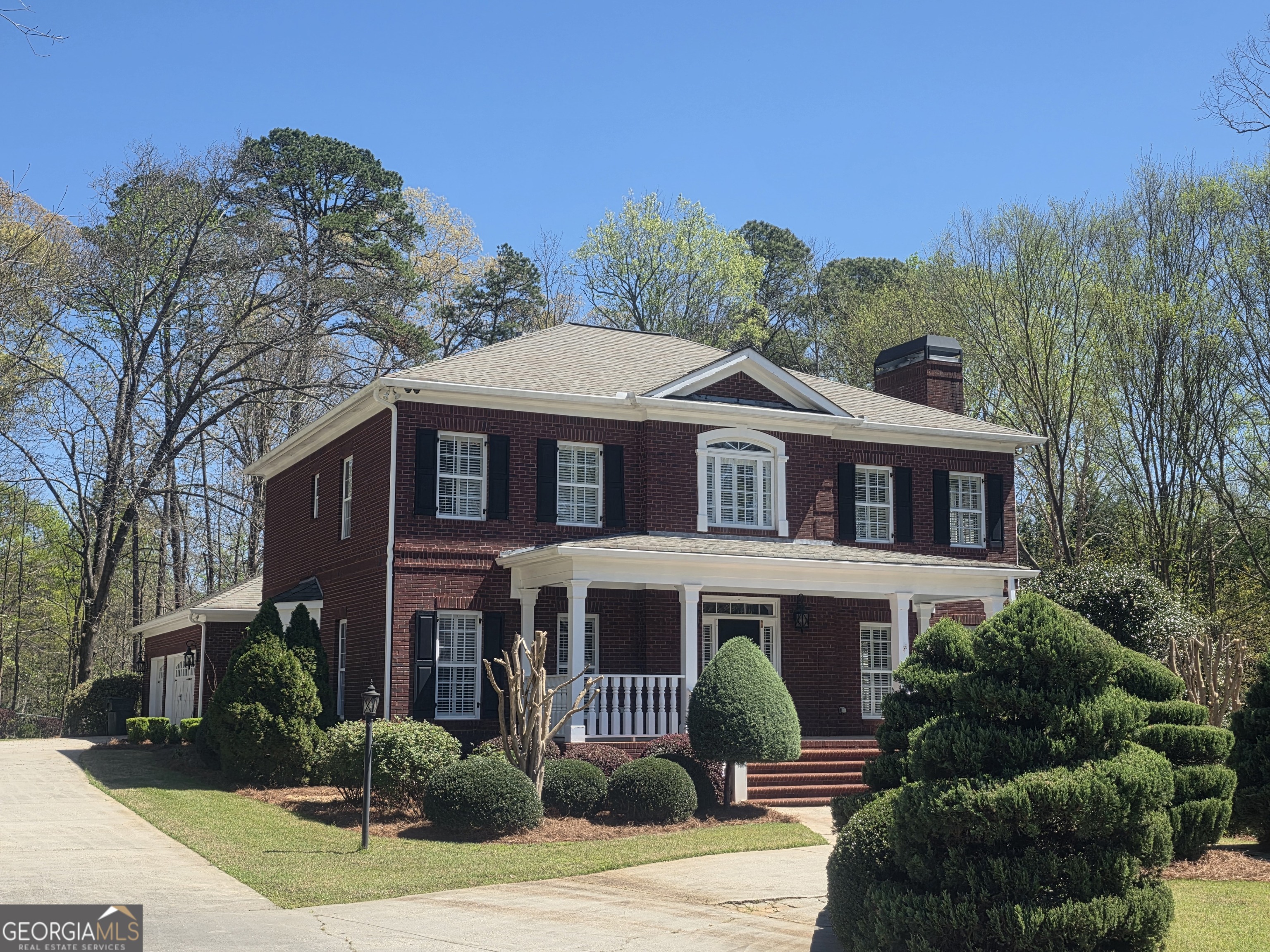306 Calumet Lane Monroe, GA 30655 - Photo 4 of 13 a front view of a house with a yard