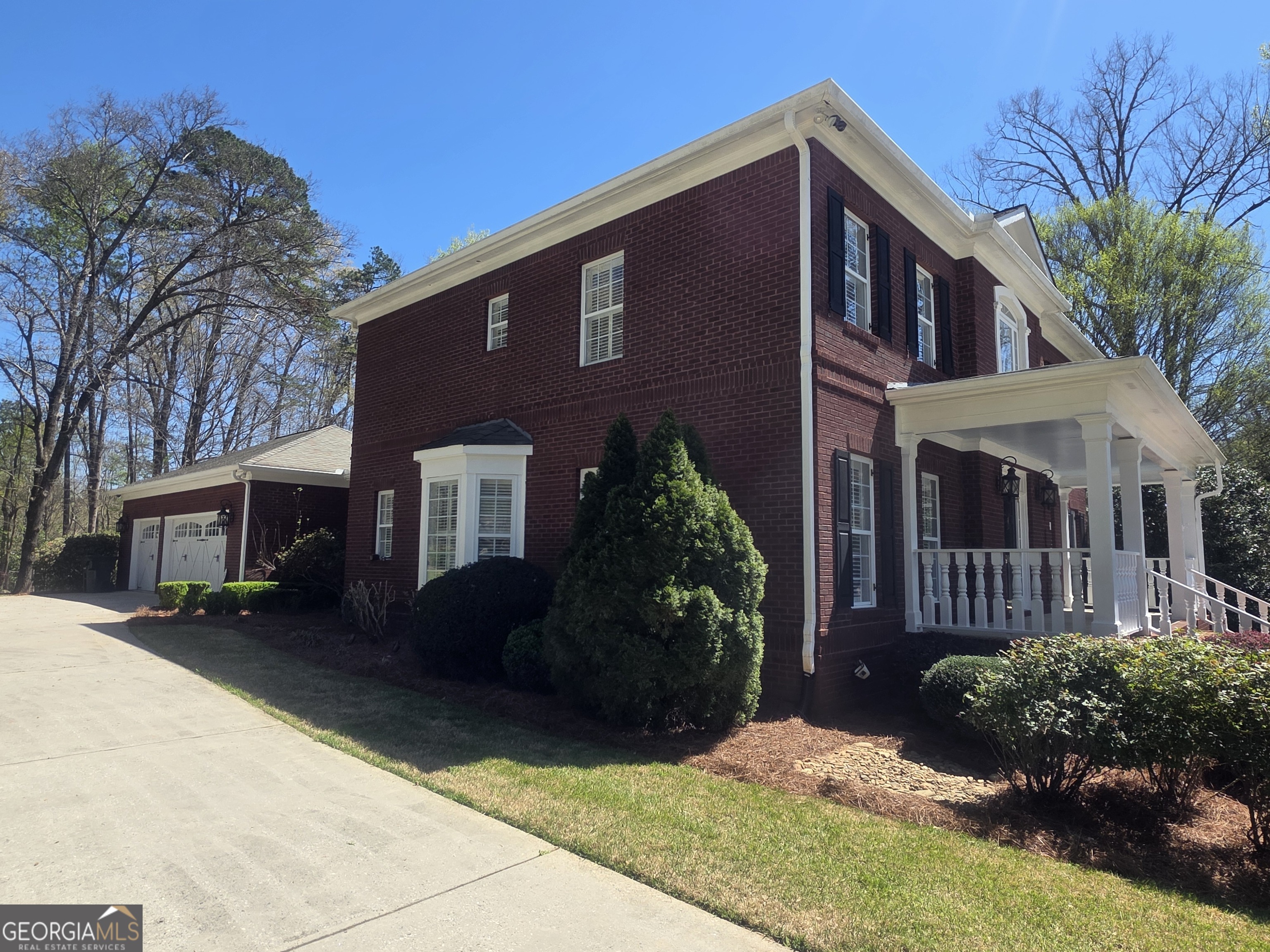 306 Calumet Lane Monroe, GA 30655 - Photo 6 of 13 a front view of a house with a yard