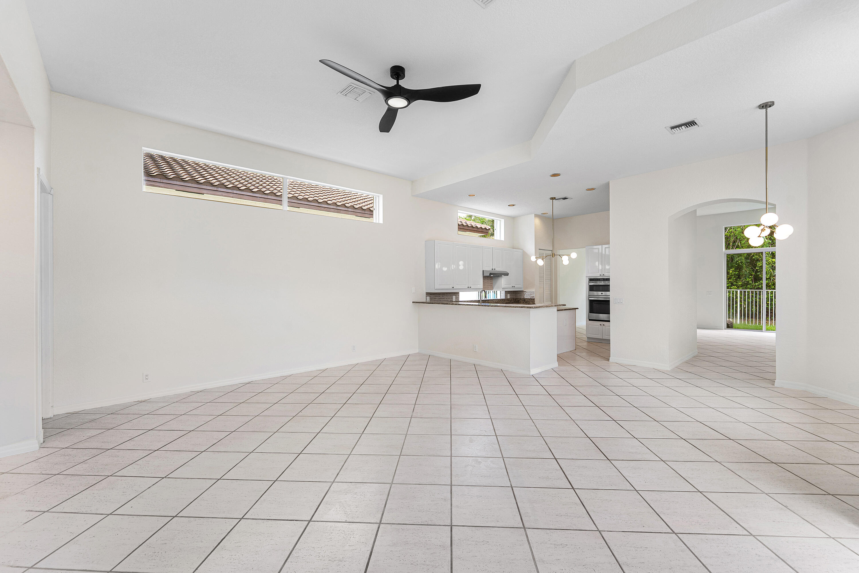 18596 Ocean Mist Drive Boca Raton, FL 33498 - Photo 19 of 51 Large Family Room Open To Kitchen