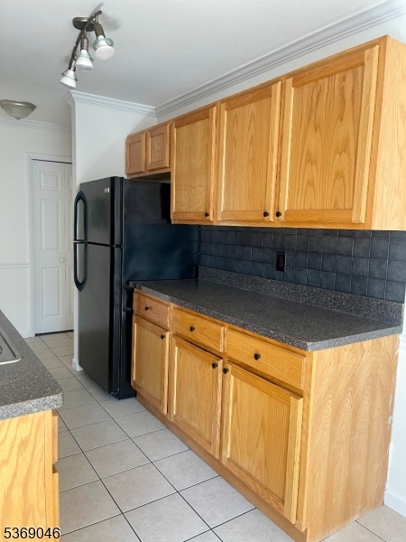 21 River Road, Unit G Nutley, NJ 07110 - Photo 1 of 22 a kitchen with stainless steel appliances granite countertop a refrigerator and a sink