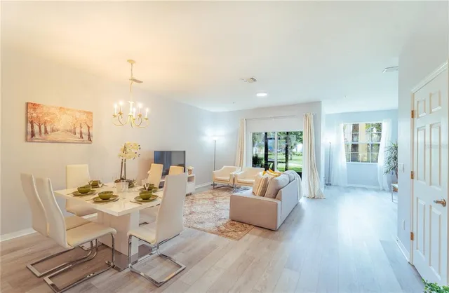 a living room with furniture and a table