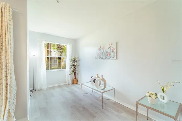 a view of livingroom with furniture and windows