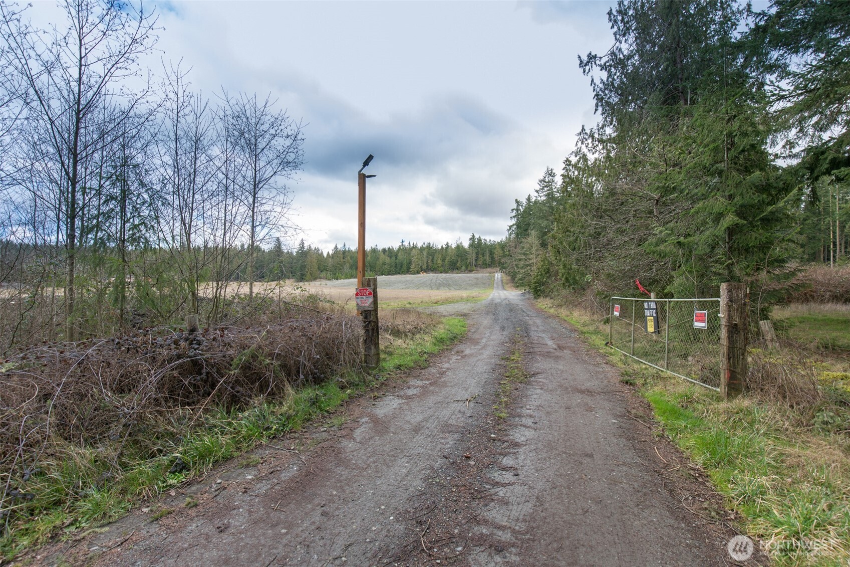 1 Highway 101 Sequim, WA 98382 - Photo 3 of 20 a view of a park with large trees