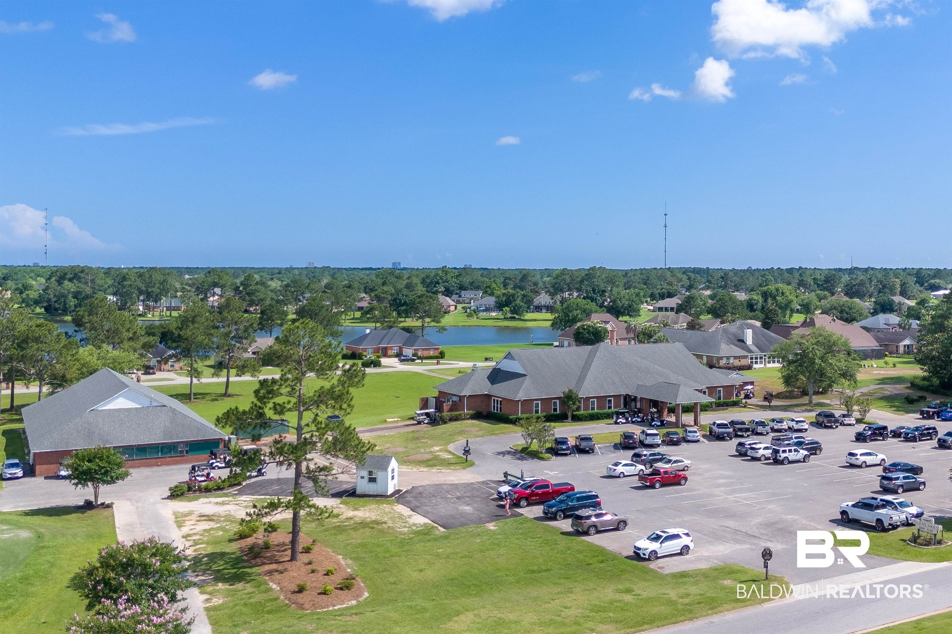 22739 Inverness Way Foley, AL 36535 - Photo 71 of 80 Aerial perspective of suburban area featuring a large body of water