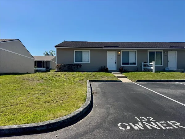 a view of a house with swimming pool
