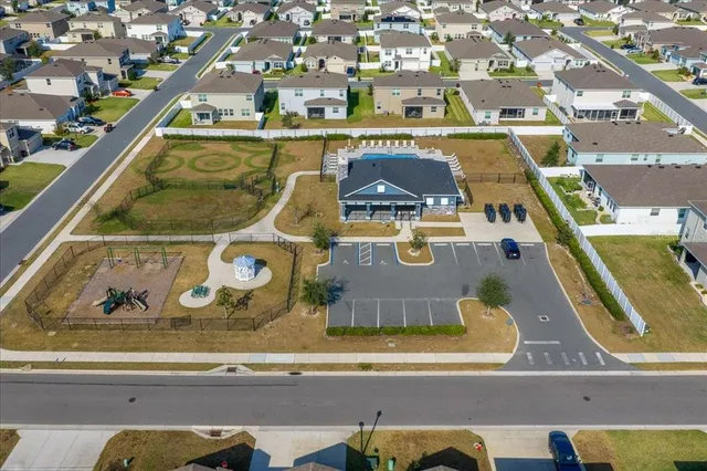 a bedroom with a bed and a chair