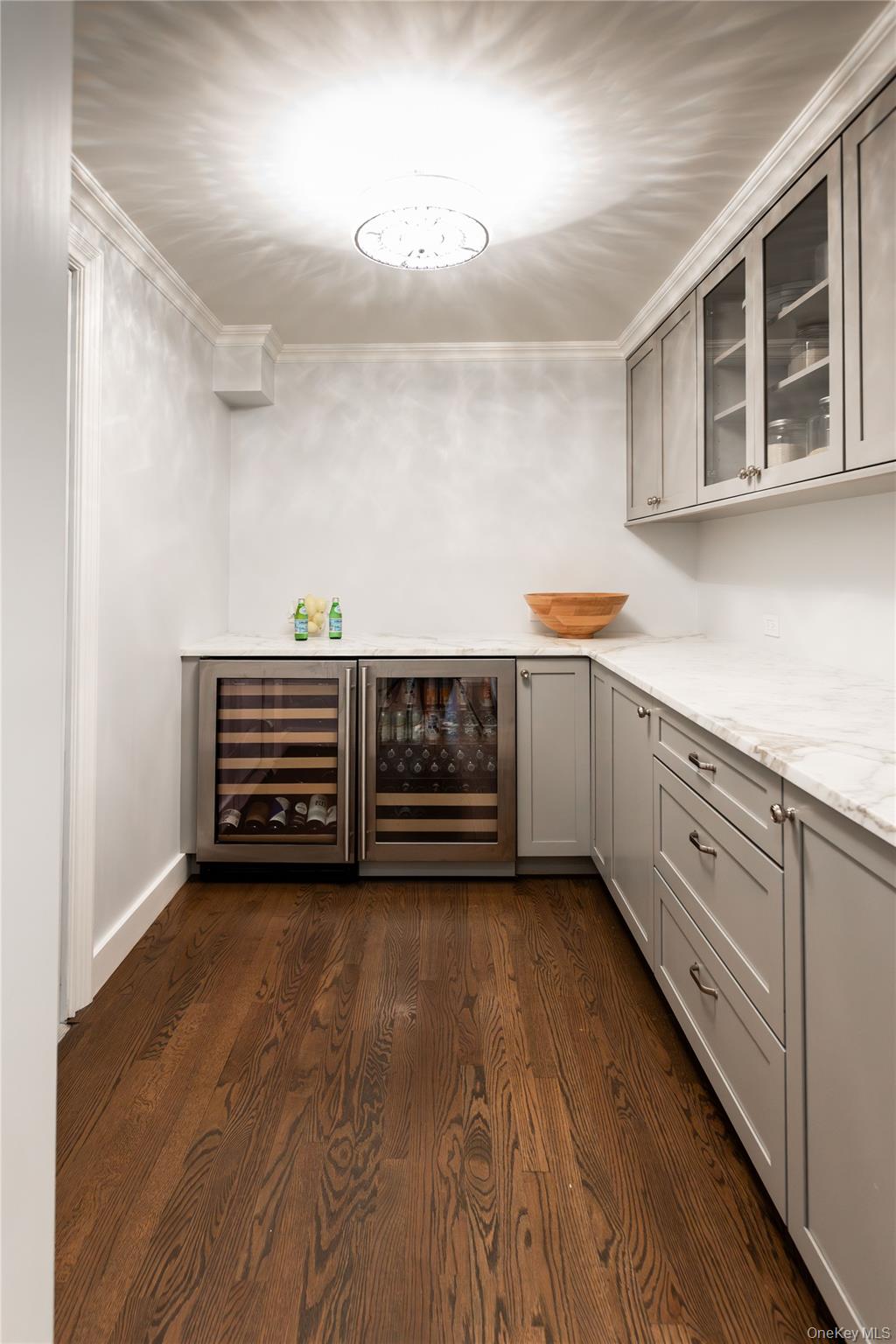 20 Mill Spring Road Manhasset, NY 11030 - Photo 8 of 17 a view of a kitchen with stainless steel appliances granite countertop a stove and a sink