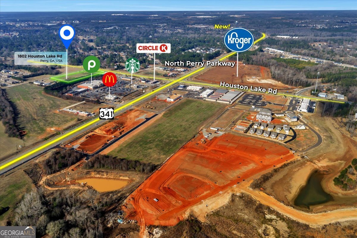 1802 Houston Lake Road Perry, GA 31069 - Photo 2 of 6 view of a tennis court