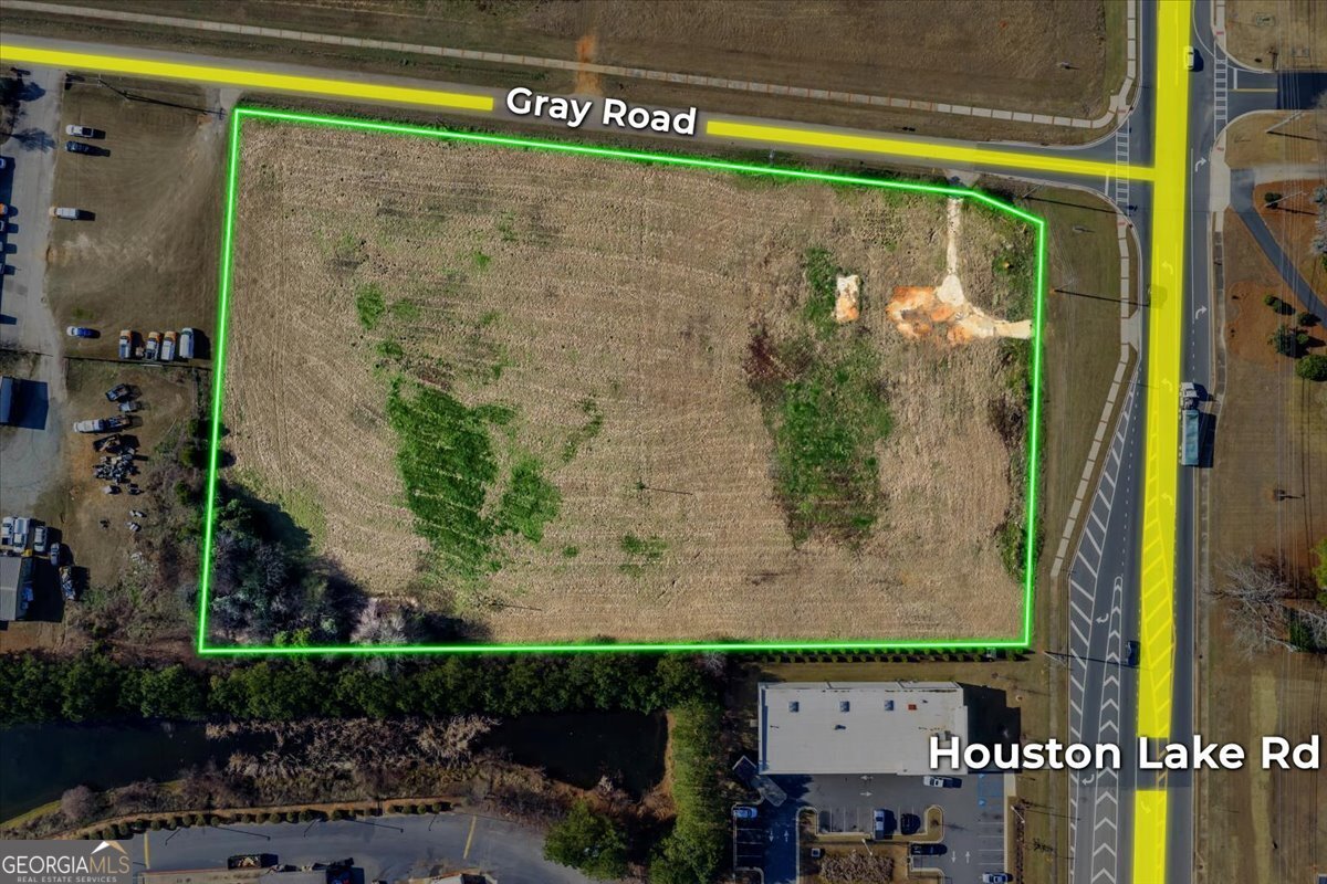 1802 Houston Lake Road Perry, GA 31069 - Photo 6 of 6 a view of a brick house with a street